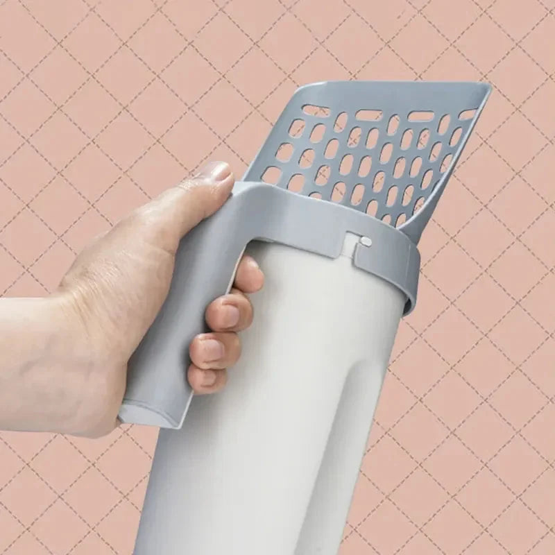 Pelle à litière avec sac intégré